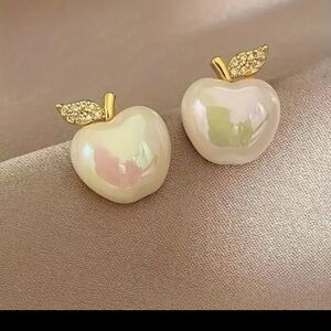 Gold tone apple of my eye stud earrings